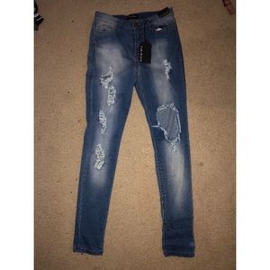 Fashion Nova size 15 (W31) medium wash jeans